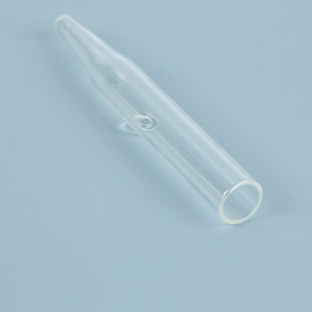 Small clear glass suction tube